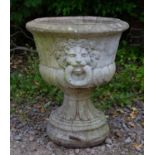 A cast reconstituted stone urn with lion mask ring handles, 54cm diameter x 64cm highCondition
