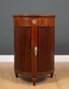 A 19th century mahogany D shaped side table with single frieze drawer and double tambour front,