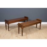 A mahogany window seat with rectangular top and turned tapering legs, 137cm wide x 33cm deep x