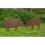 A pair of large steel profile pigs with stakes for mounting in a lawn, each pig 115cm long x