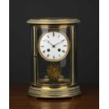 A 19th century French oval four glass mantle clock with bands of engraved ornament to the case,
