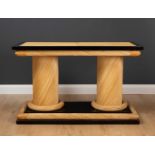 An ebonised and wicker woven twin pedestal rectangular centre table, 114.5cm long x 50cm wide x 71.