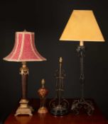 A 20th century painted wrought iron table lamp, 67cm in height; a gilt and glass table lamp of