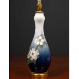 A Royal Copenhagen blue and white porcelain table lamp with gilt metal base stamped 'Royal