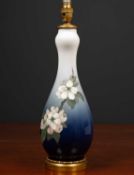 A Royal Copenhagen blue and white porcelain table lamp with gilt metal base stamped 'Royal
