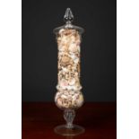 A large lidded glass vase fitted with seashells, 65cm in heightCondition report: At present, there