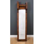 An antique burr walnut gothic style pier mirror with shaped top, 43.5cm wide x 76cm highCondition