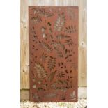 A pierced steel panel decorated with fern leaves, 58cm wide x 114.5cm highCondition report: At