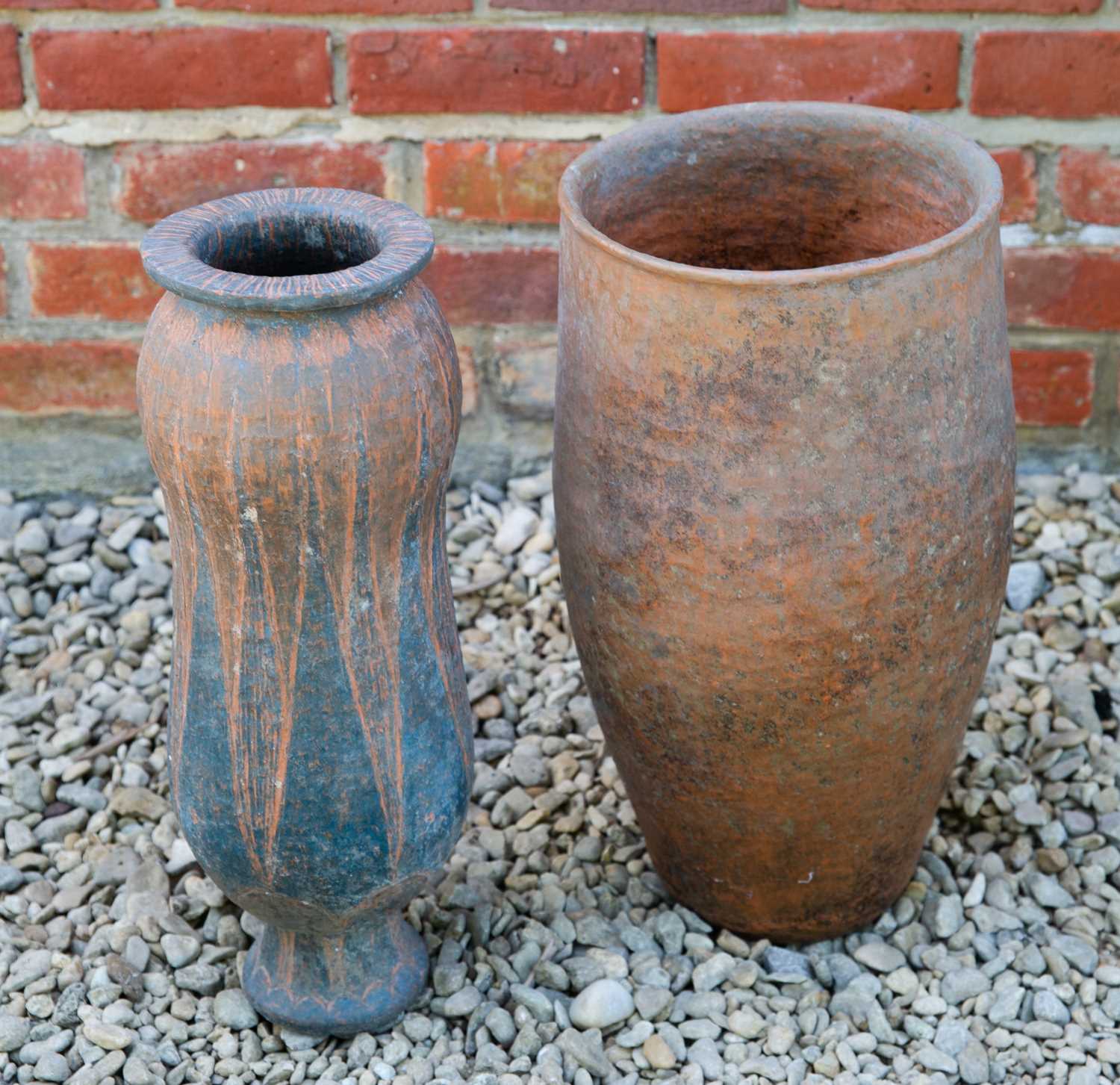 Two Barbara Tribe terracotta pots pierced with holes to the base, the larger 23cm wide x 45cm - Image 2 of 2