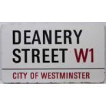 An Enamel London road sign for 'DEANERY STREET W1'76.5cm x 44cmCondition report: Marks due to