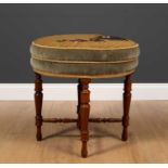 A Victorian walnut circular dressing table stool with beadwork decorated cover to the circular