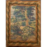 A late 20th century Aubusson style verdure tapestry panel depicting countryside with a church in the