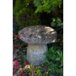 A short square section staddle stone together with a tapering circular staddle stone, the square