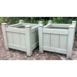 A pair of green painted square wooden planters 42cm wide x 41cm highCondition report: Weathered