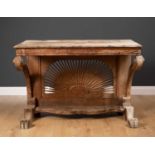 A colonial hardwood conservatory console table with radiating panel to the back, scroll supports and