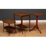 A mahogany and elm rectangular topped tripod table together with a low oval two tier occasional