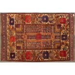 A mid to late 20th century Middle Eastern flat weave woollen rug with stylised foliate decoration,