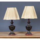 A pair of cast and painted metal table lamps of urn form, each 46cm in height excluding