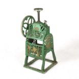 An early 20th century green painted cast iron ice cutter by Swan, with adjusting handles, 75cm