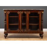 A 19th century French empire style rosewood marble topped side cabinet with gilt mounts, twin glazed
