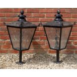 A pair of black painted square section pier top lanterns each 39cm wide x 75cm highCondition report: