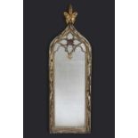 A mid to late 20th century gilded full length mirror with an acanthus flowerhead crest, 70cm wide