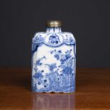 An 18th century Dutch delftware tea canister decorated with a dragonfly perched on a rocky outcrop