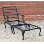 A black painted cast aluminium garden chair with cast cabriole legs together with a matching