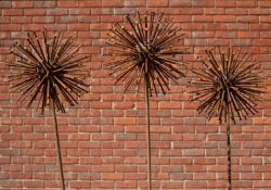 A set of three wrought iron 'Allium Nail Head' ornaments each 28cm diameter x approximately 168cm