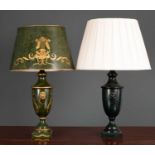 A green toleware table lamp and shade with lion mask ring handles, the lamp and shade 68cm high