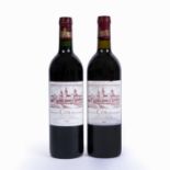 A bottle of Chateau Cos D'Estournel 1982 together with a further bottle from the same Chateau