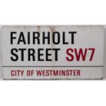 An enamel London road sign for 'FAIRHOLT ST SW7', 84cm x 44cmQty: 1Condition report: Minor marks due