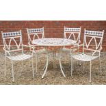 A modern circular garden table with mosaic inset top and four matching armchairs, the table 90cm