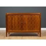 A Gordon Russell double helix hardwood side cabinet, designed by David Booth & Judith Ledeboer,