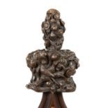 An antique carved oak pew finial with birds and mice amongst foliage, 20cm wide x 31cm high, mounted