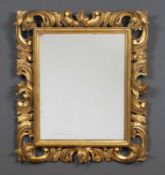 An Italian gilded and carved wooden framed mirror 62cm wide x 71cm highCondition report: Some