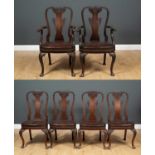 A set of six early 18th century style mahogany dining chairs with vase shaped splats, overstuffed
