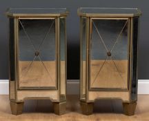 A pair of modern bevelled glass panelled bedside cabinets each with single doors and square tapering