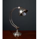 An adjustable white metal table lamp with curving arm and circular base, 48cm highCondition