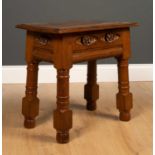A carved oak box seat joint stool signed 'Evelyn De La Rue July 22 1948', 50cm wide x 30cm deep x
