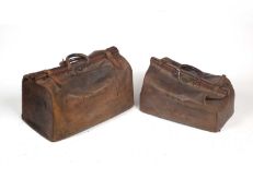 Two old leather Gladstone bags, the larger 61cm wide, the smaller 53cm wideCondition report: In used