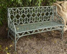 A gothic style cast aluminium green painted garden bench 138cm wideCondition report: In weathered