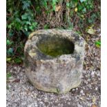 A medieval period octagonal limestone mortar, weathered with handles chipped off and a rim section
