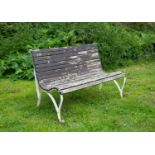 A white painted wrought iron garden bench with wooden slats, 119cm wide x 82cm highCondition report: