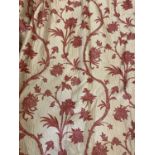 A large pair of beige or light gold ground silk lined curtains with red embroidered exotic vine