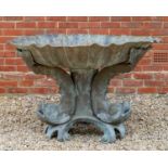 A large bronze fountain with petal moulded bowl on three dolphin supports and scroll feet, 152cm