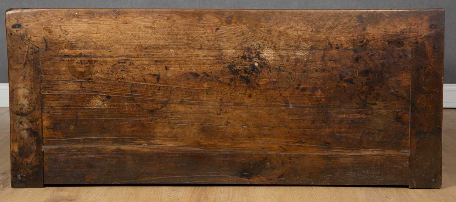 An early 19th century French oak and walnut side cabinet with three drawers above two doors, with - Image 6 of 6