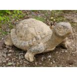 A cast reconstituted stone sculpture of a tortoise approximately 42cm wide x 66cm longCondition
