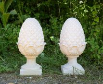 A pair of cast composite white painted pine cone finials, 52cm highCondition report: In good