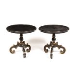 A pair of black lacquered occasional tables with gilded decoration and three scrolling legs, each